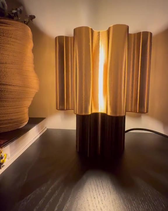 RHYTHM in Amber, glowing in a dark room